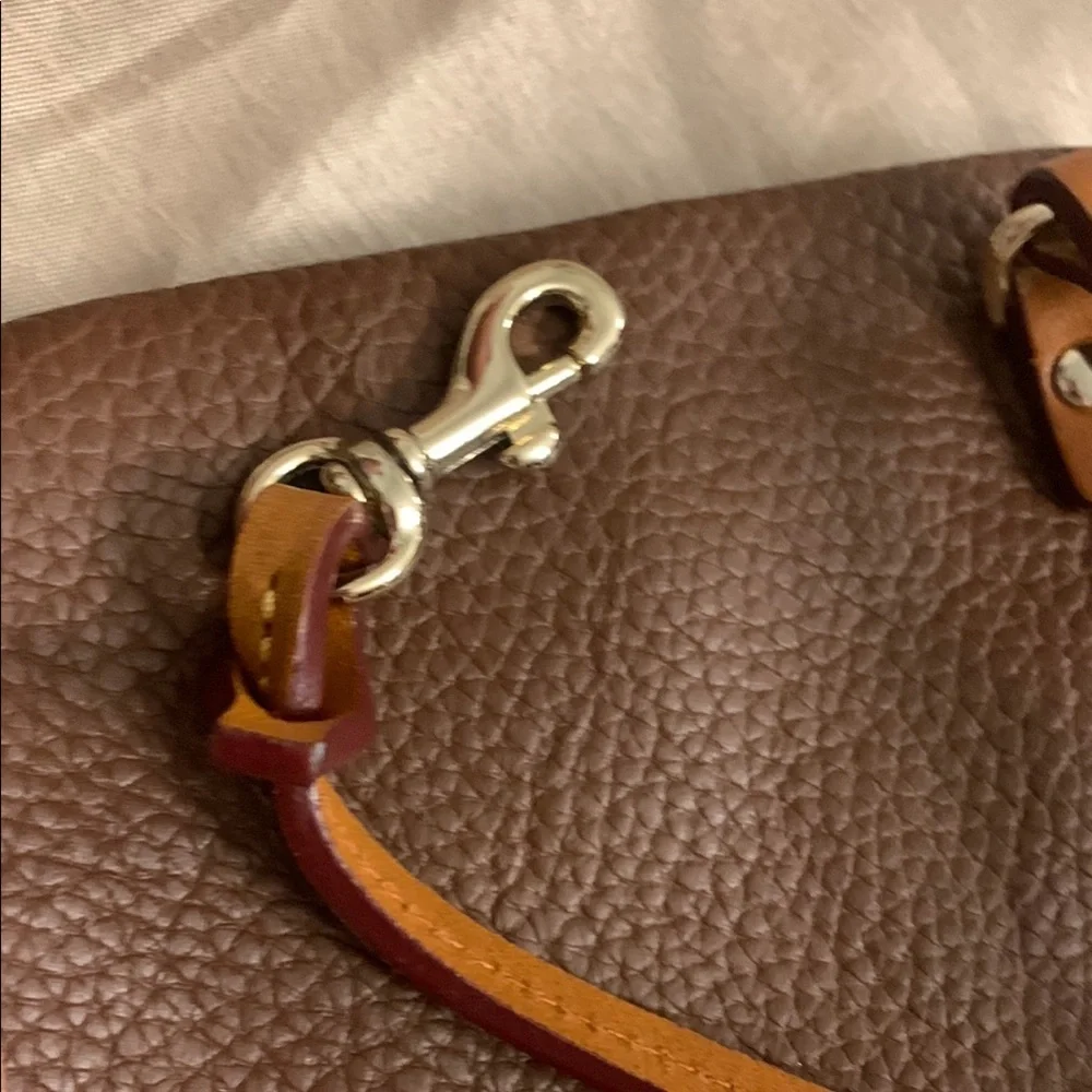 Dooney & Bourke Leather with Flap Closure and Wristlet NEVER USED LIKE NEW